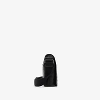 Embossed Check Messenger Bag​ in Black - Men | Burberry® Official
