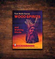 Tom Wolfe Carves Wood Spirits and Walking Sticks