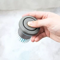 Tovolo Twist N’ Scrub Soap-Dispensing Palm Brush