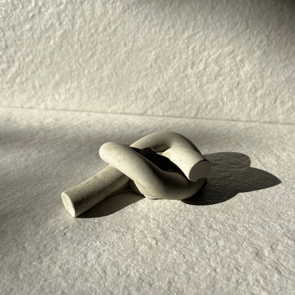 Aaram Lux Concrete Knot Candle Holder | West Elm