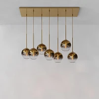 Sculptural 7 Light Chandelier Antique Brass Clear Glass Globe  6.5"