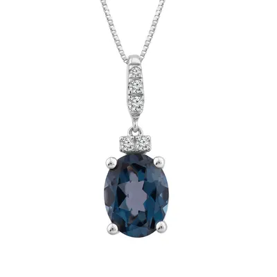 Oval London Blue Topaz & Diamond Accent Drop Pendant in 10K White Gold