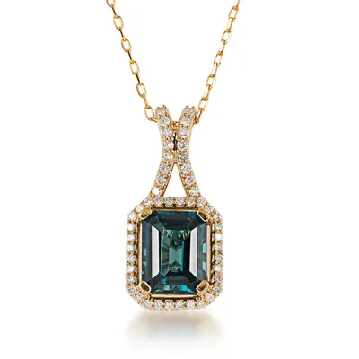 Emerald Cut London Blue Topaz & 1/4 ct. tw. Diamond Halo Pendant in 10K Yellow Gold