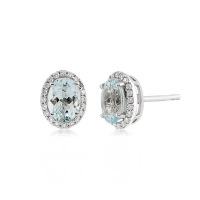 Oval Aquamarine & / ct. tw. Diamond Halo Earrings in 14K White Gold