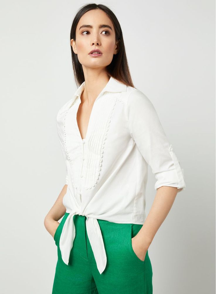 Blusa camisera con nudo