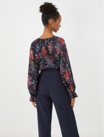 Blusa Floral con Plisado Radial