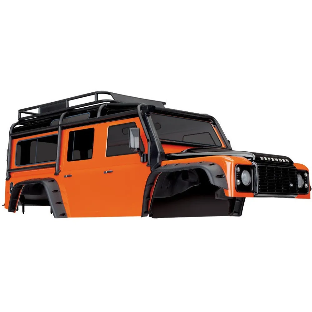 Traxxas Body, Land Rover Defender, adventure orange (complete with ExoCage, inner fenders, fuel canisters, and jack)