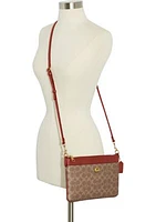 Coated Canvas Signature Polly Crossbody Bag