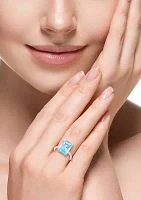 1/10 ct. t.w. Diamond and Sky Blue Topaz Ring in 14K White Gold