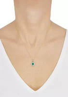 1/10 ct. t.w. Diamond and Emerald Pendant Necklace with 18" Singpore Chain in 14K Yellow Gold