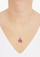 1/10 ct. t.w. Diamond and Ruby Flower Pendant Necklace with 18" Box Chain in 10K Yellow Gold