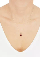 1/10 ct. t.w. Diamond and Garnet Pendant Necklace with 18" Rope Chain in 10K Yellow Gold