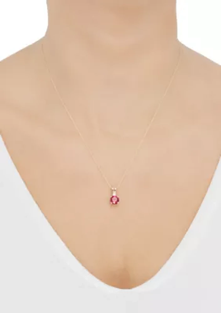 1/10 ct. t.w. Lab Created Diamond and Lab Created Ruby Pendant Necklace with 18'' Rope Chain in 10K Yellow Gold