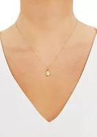 1/10 ct. t.w. Diamond Oval Pendant Necklace in 10K Yellow Gold 