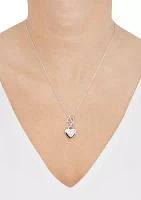 1/10 ct. t.w. Diamond Interlock Heart Necklace in Sterling Silver