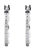 1/10 ct. t.w. Diamond Hoop Earrings in Sterling Silver and 3K White Gold