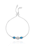 Created Opal, Blue Topaz, and White Topaz Bracelet in Sterling Silver