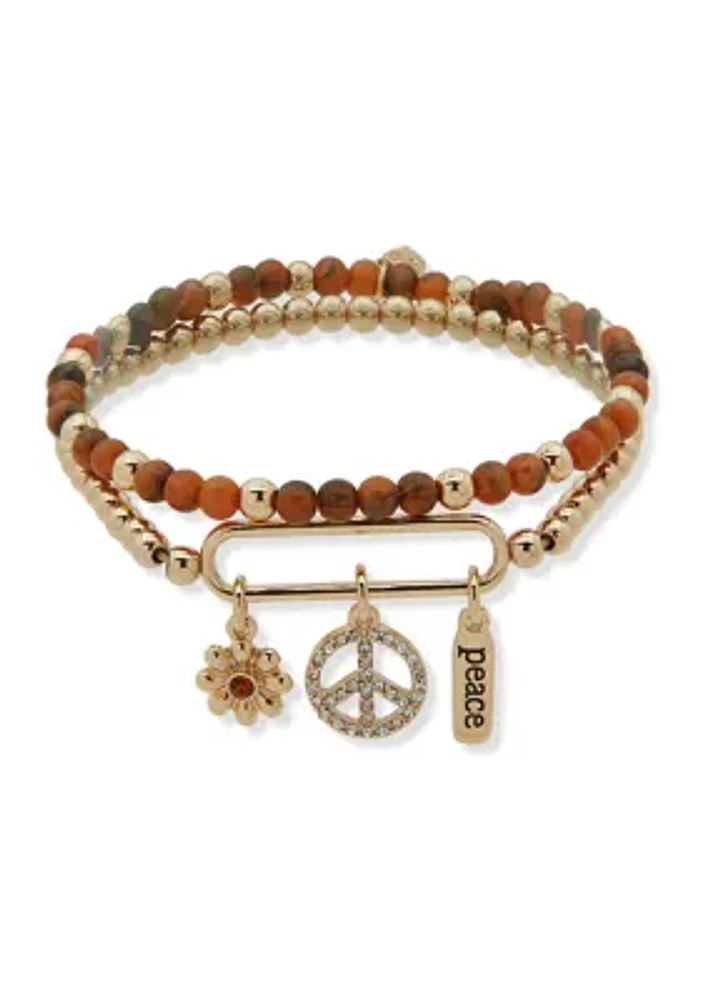 Gold Tone Topaz Peace Stretch Bracelet Set