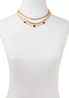 Gold Tone Multi Row Red Stone Necklace