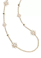 Gold Tone Starburst Long Strand Necklace