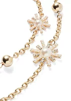 Gold Tone Starburst Long Strand Necklace