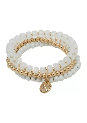 Gold Tone 4 Row Multi White Beaded Stretch Bracelet