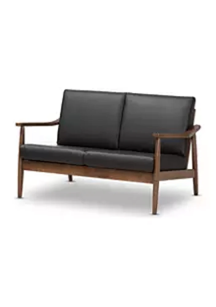 Baxton Studio Venza Mid-Century Modern Walnut Wood Black Faux Leather 2-Seater Loveseat