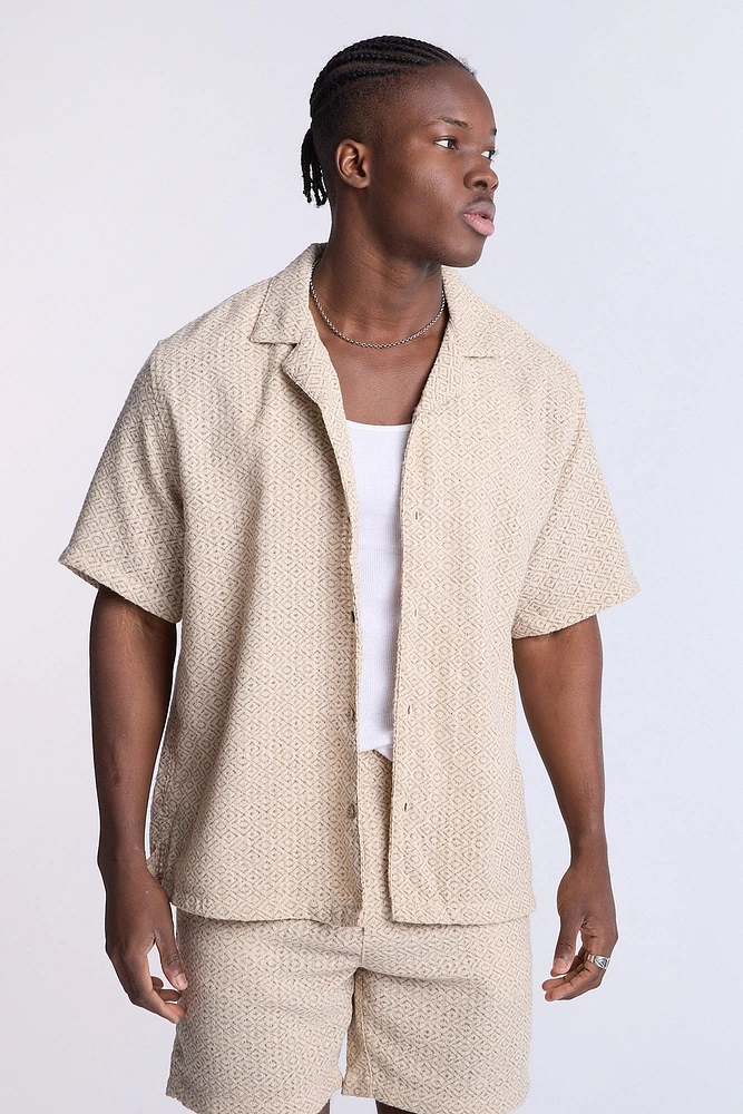 Haut en tricot texturé à manches courtes géometrique