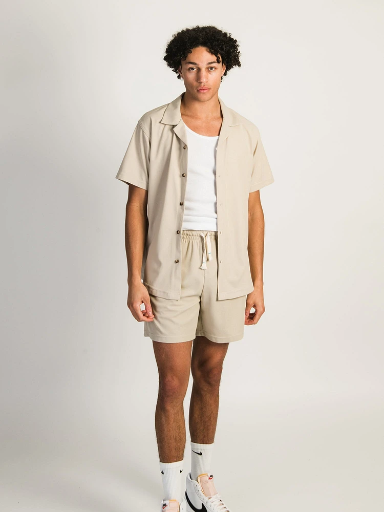 SHORT TISSÉ EN FIL TEINT