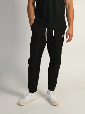 NIKE WOVEN TAPERED LEG PANT