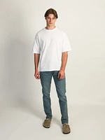 TAINTED SLIM FIT DENIM JEANS - MID WASH