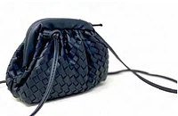 LACEY WOVEN CLUTCH