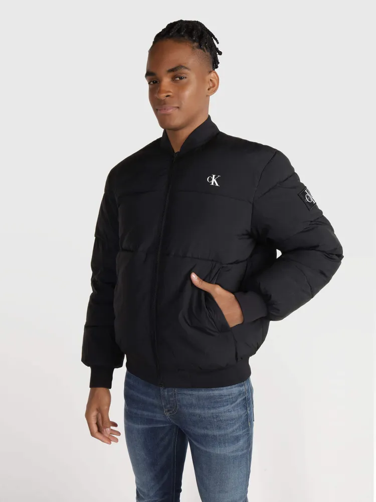 Calvin Klein - Chaqueta universitaria con mangas de cuero para hombre,  color negro, pequeño Calvin Klein Chaqueta de universidad