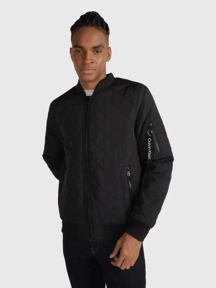 Calvin Klein - Chaqueta universitaria con mangas de cuero para hombre,  color negro, pequeño Calvin Klein Chaqueta de universidad