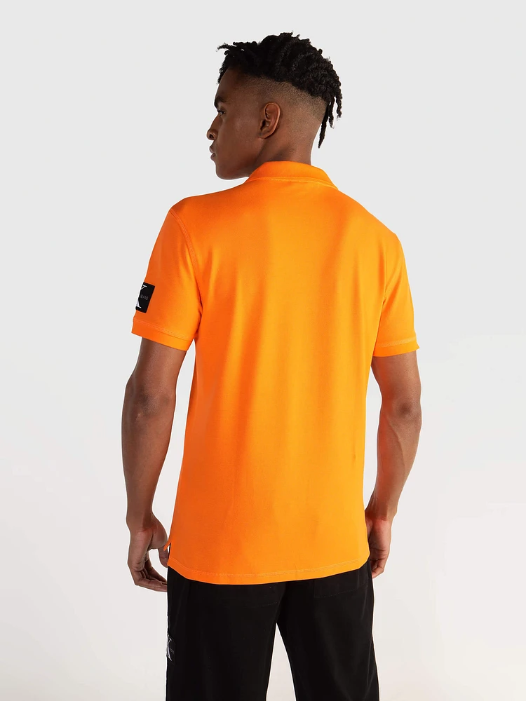 Polo Calvin Klein Logo Hombre Naranja