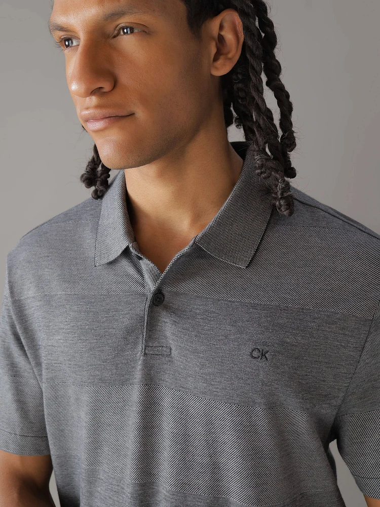 Polo Calvin Klein con Franjas Jaspeadas Hombre Gris