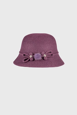 Cloche hat with fur and flower trim