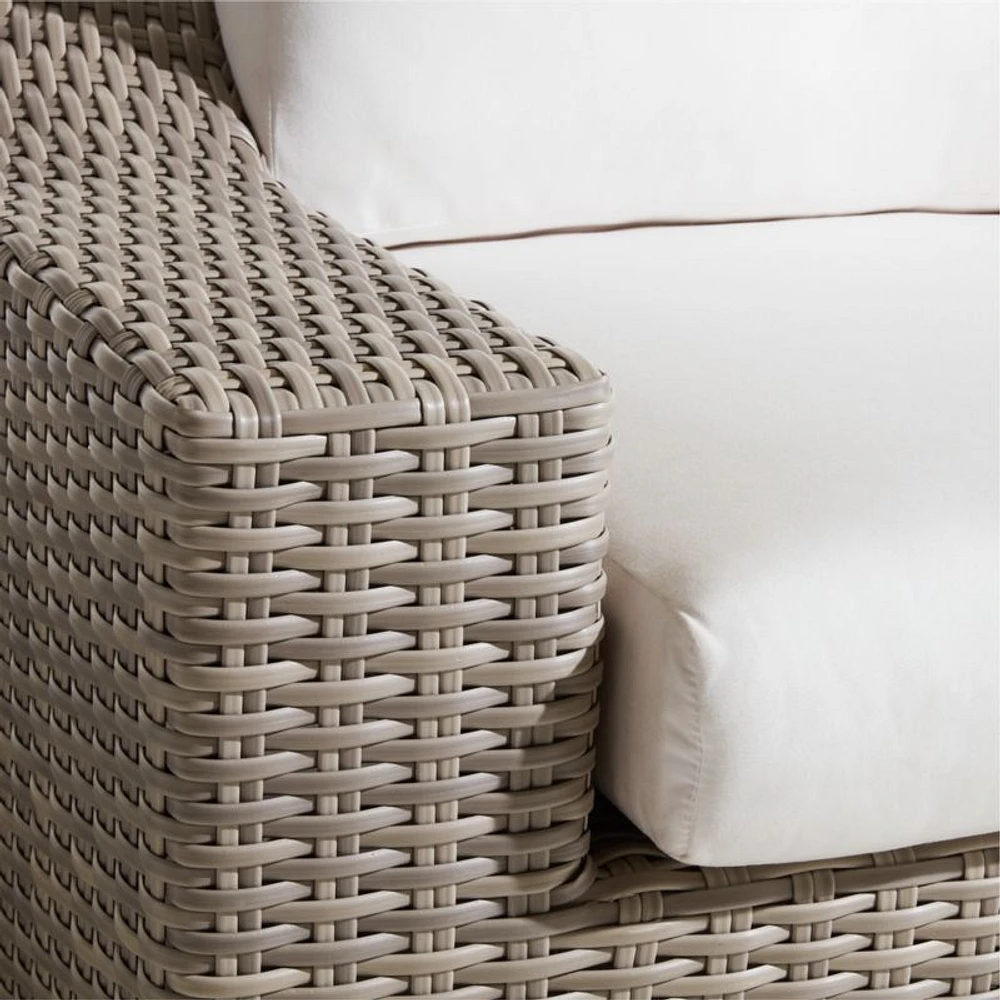 Abaco Resin Wicker Outdoor Swivel Lounge Chair with Natural Sunbrella ® Cushions