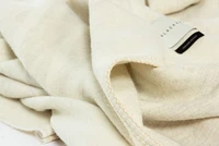 Blacksaw Dopamine 53"x70" Alpaca Ivory Reversible Throw Blanket