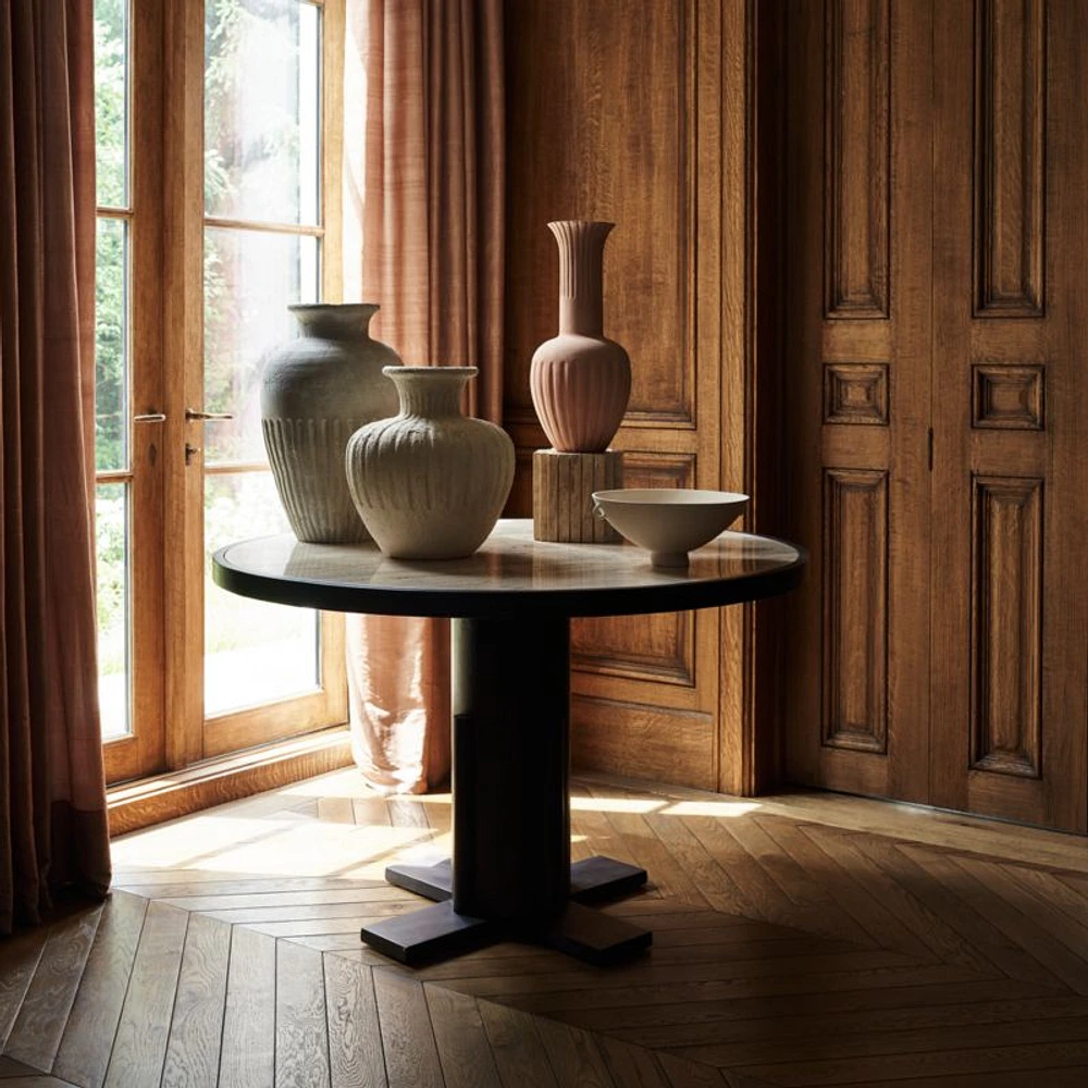Unica 48" Round Mango Wood and Travertine Dining Table by Athena Calderone