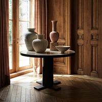 Unica 48" Round Mango Wood and Travertine Dining Table by Athena Calderone