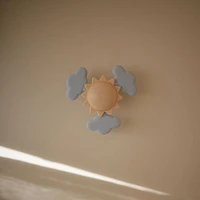 Mushie Yellow Sunshine Baby Suction Spinner Toy