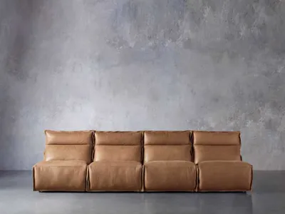 Rowland Leather 136" Four Piece Armless Motion Modular Sofa in Lanie Camel