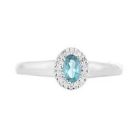 10K White Gold 0.05CTW Diamond and Blue Topaz Halo Ring