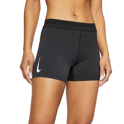 Nike Women's Tight Mid-Rise Ribbed-Panel Running Shorts with Pockets. Nike.com