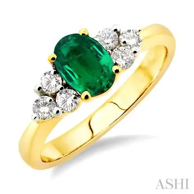 7x5mm Oval Cut Emerald and 1/3 Ctw Round Cut Diamond Ring in 14K Gold