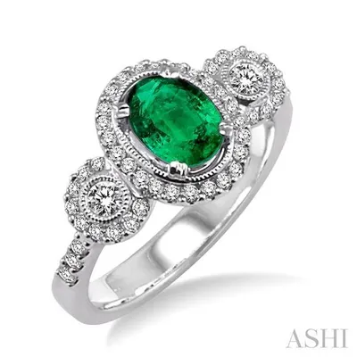 7x5MM Oval Cut Emerald and 1/2 Ctw Round Cut Diamond Ring in 14K White Gold