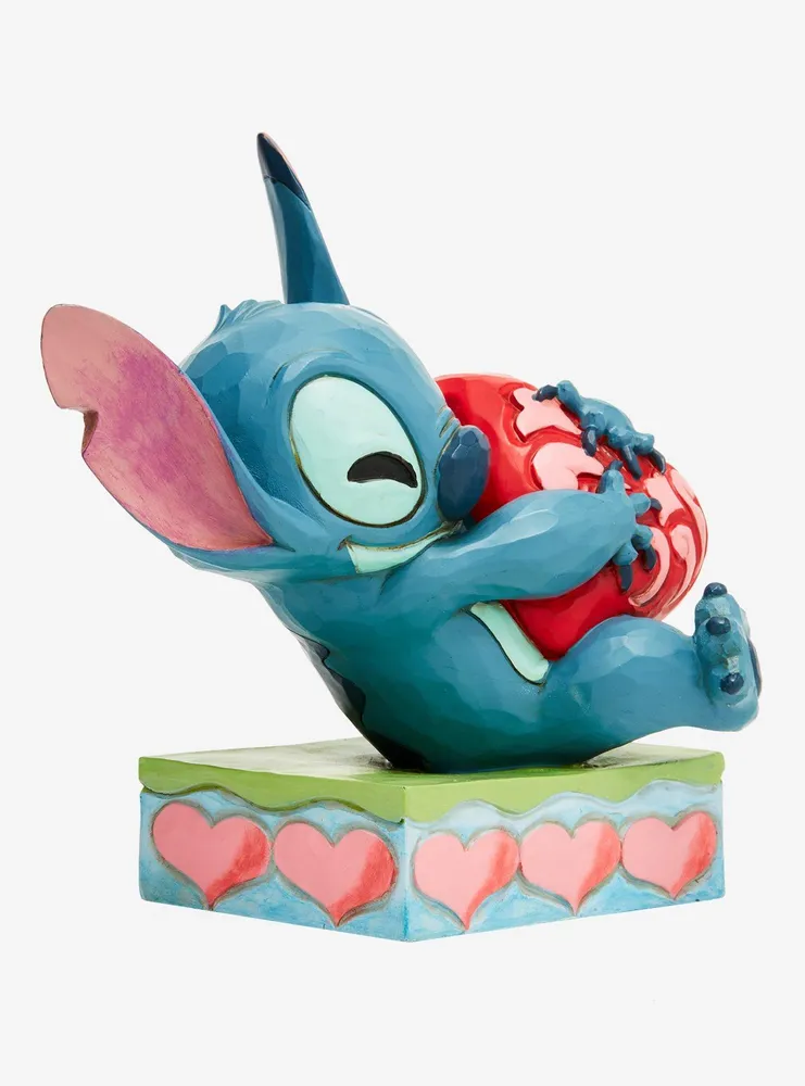 Disney Lilo & Stitch Traditions Stitch Hugging Heart Figure