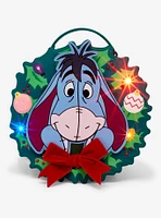 Our Universe Disney Winnie the Pooh Eeyore Holiday Wreath Convertible Light-Up Backpack — BoxLunch Exclusive