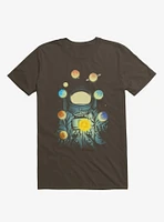 Astronaut Juggling Planets Brown T-Shirt